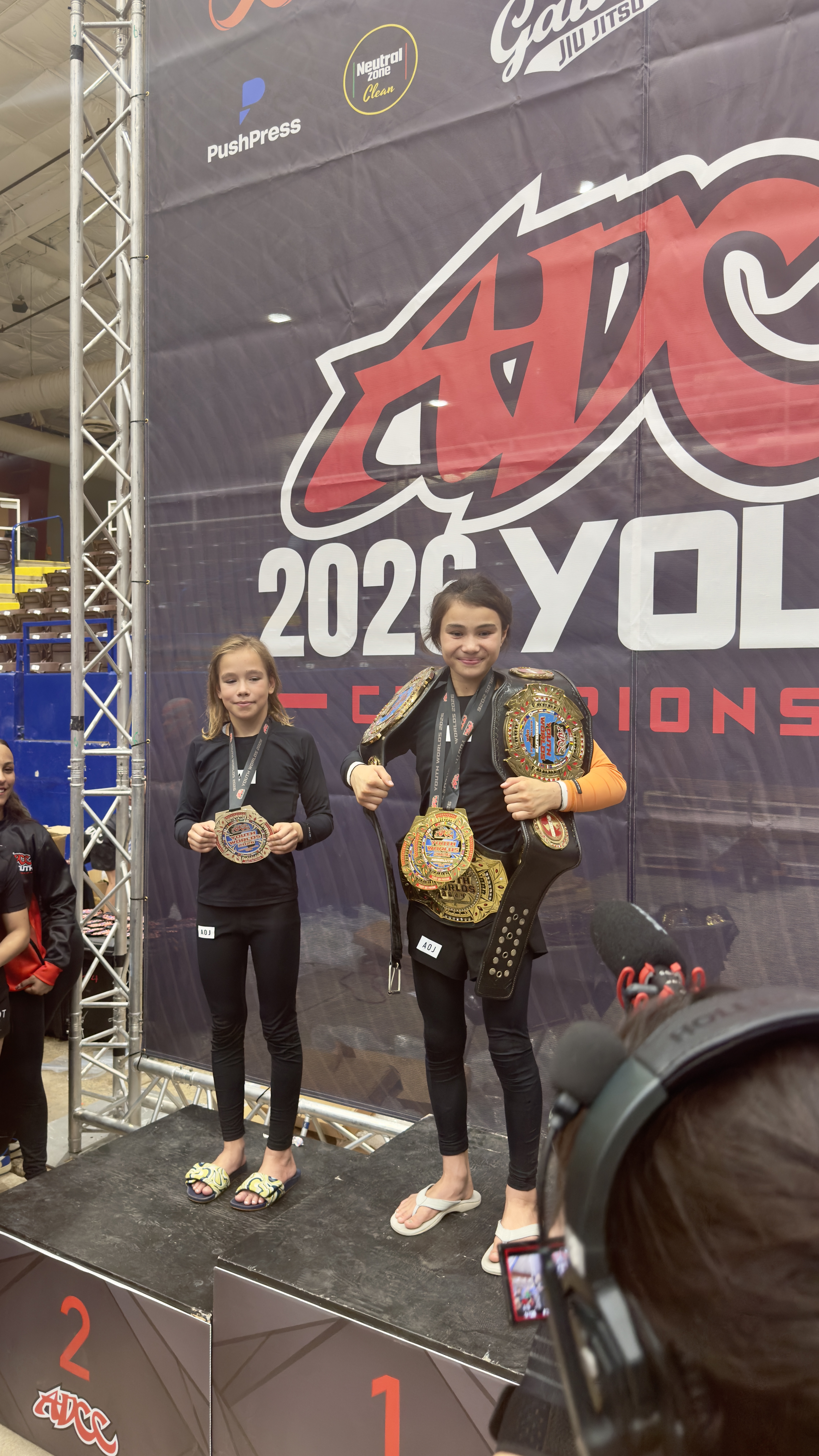 Bailey Heinsohn on the podium at the 2026 ADCC Youth World Championships.