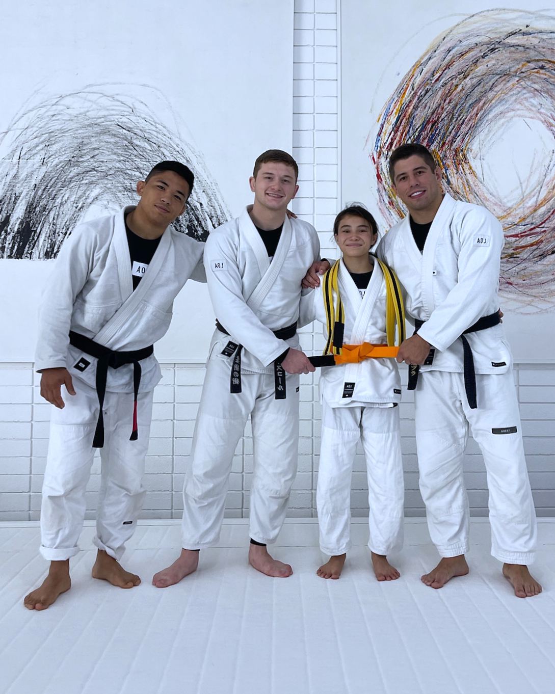 Bailey Heinsohn at her orange belt promotion in July 2026.